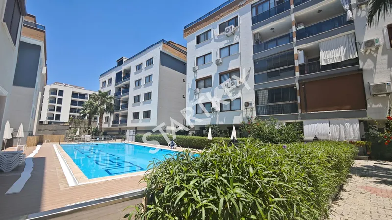 Kuşadası Değirmendere 'De Satılık 2+1 Bahçe Katı Daire